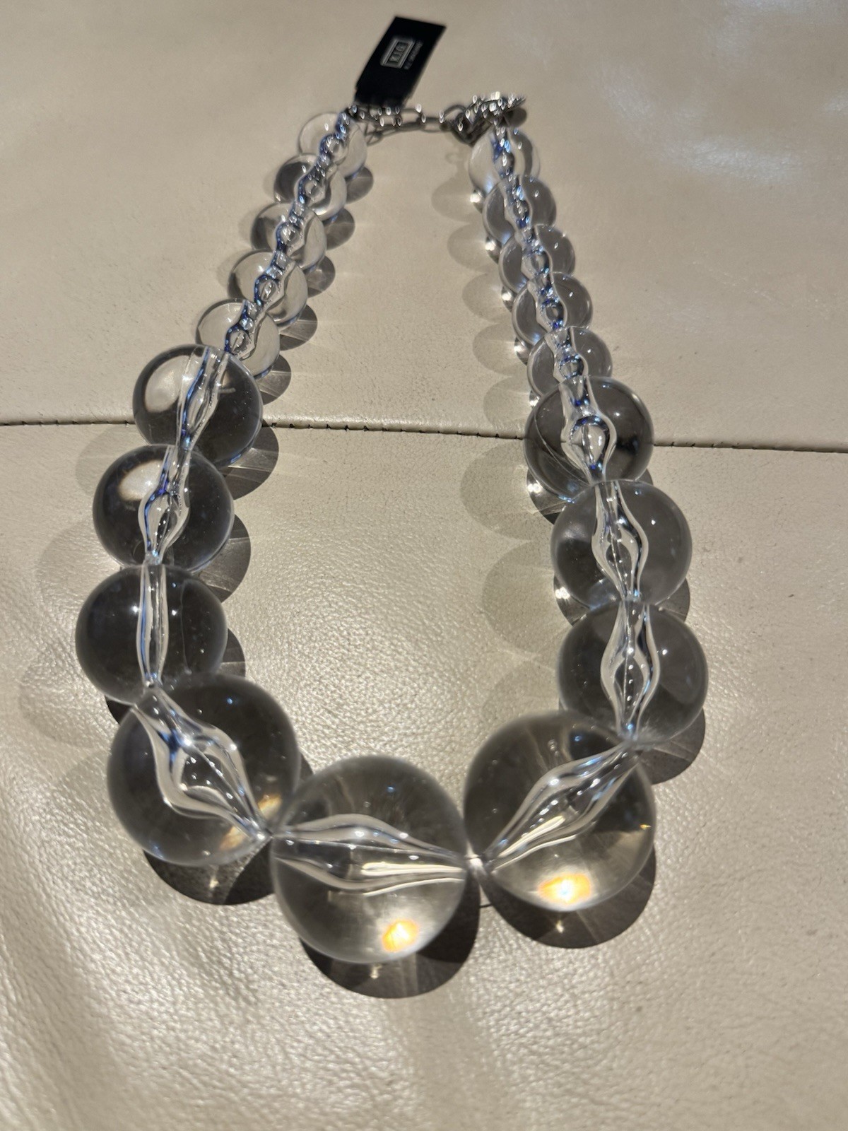 R.J.G. (RJ Graziano) Clear Acrylic Disc Beaded Statement Necklace Adjustable