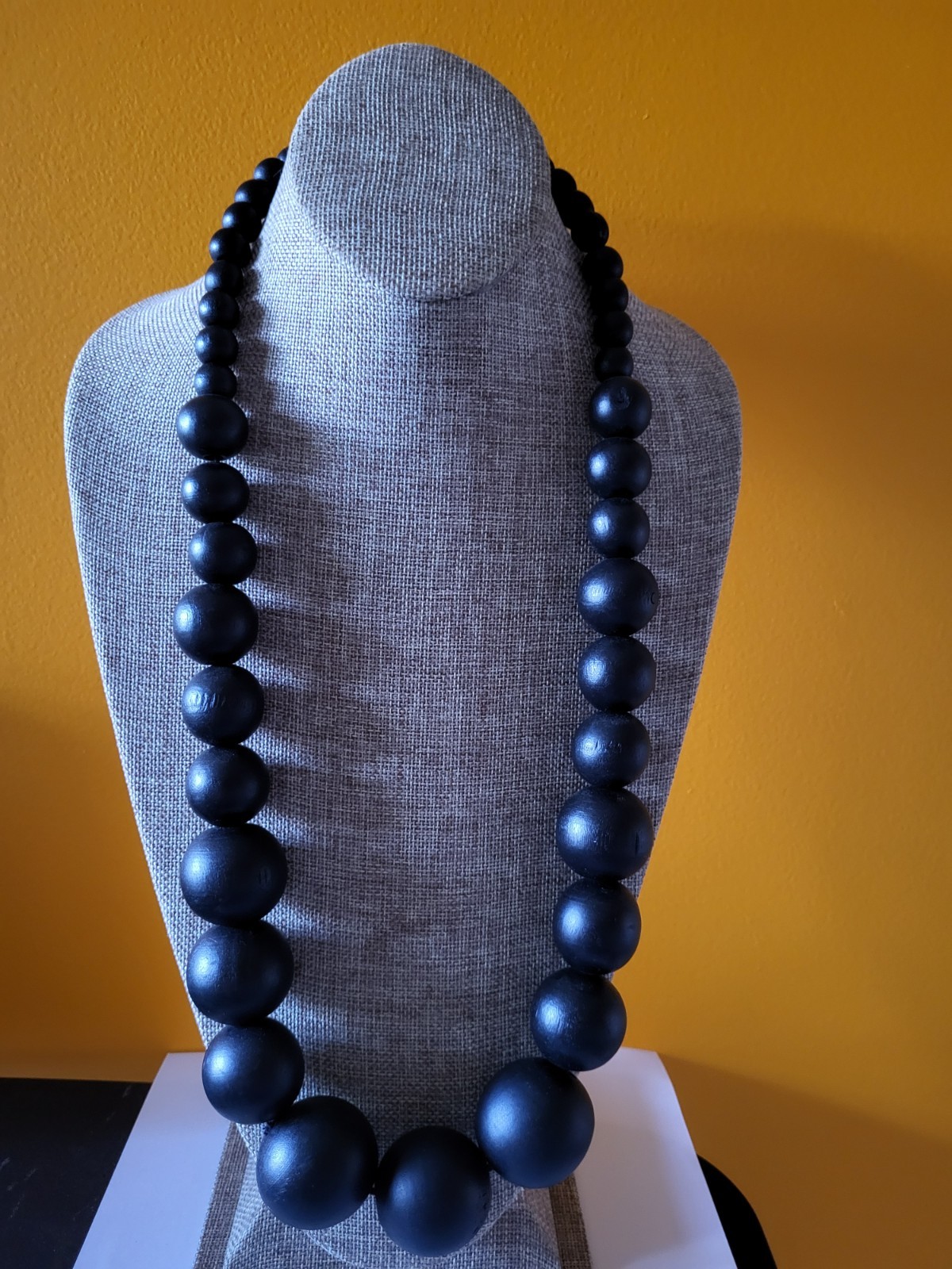 Matte black wooden beads – gradually increase in size – statement necklace