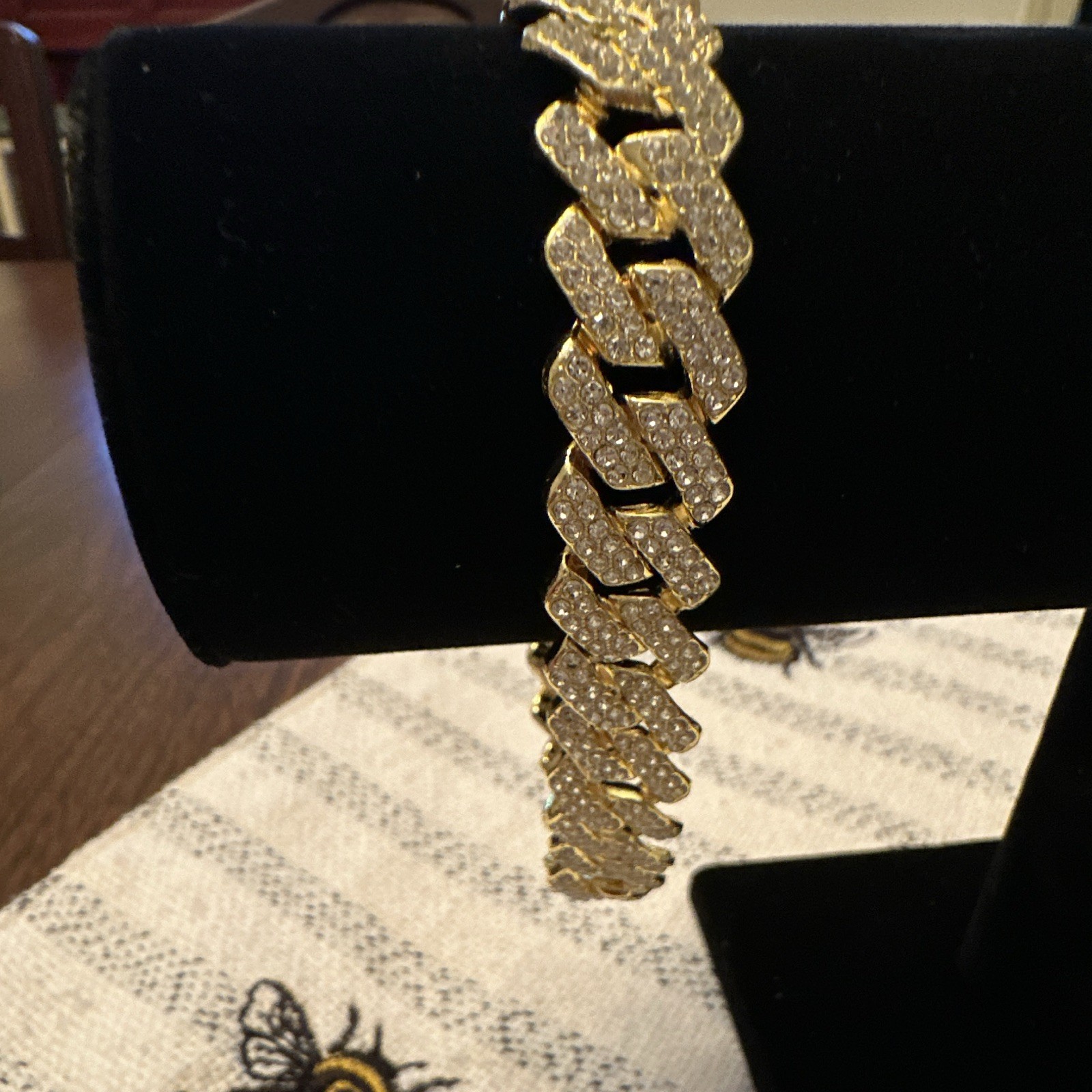 Gold Tone Cuban Link Chain Bracelet with Pavé Setting and Box Clasp Closure