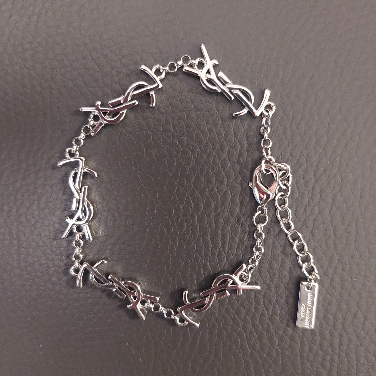 YSL Saint Laurent Silver Tone Logo Charm Bracelet