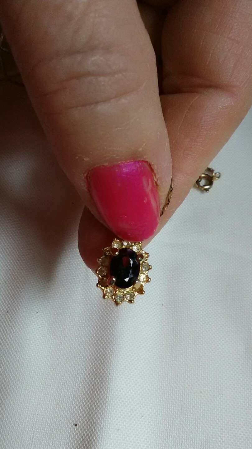 Garnet surrounded by cubic zerconia pendant January birthstone