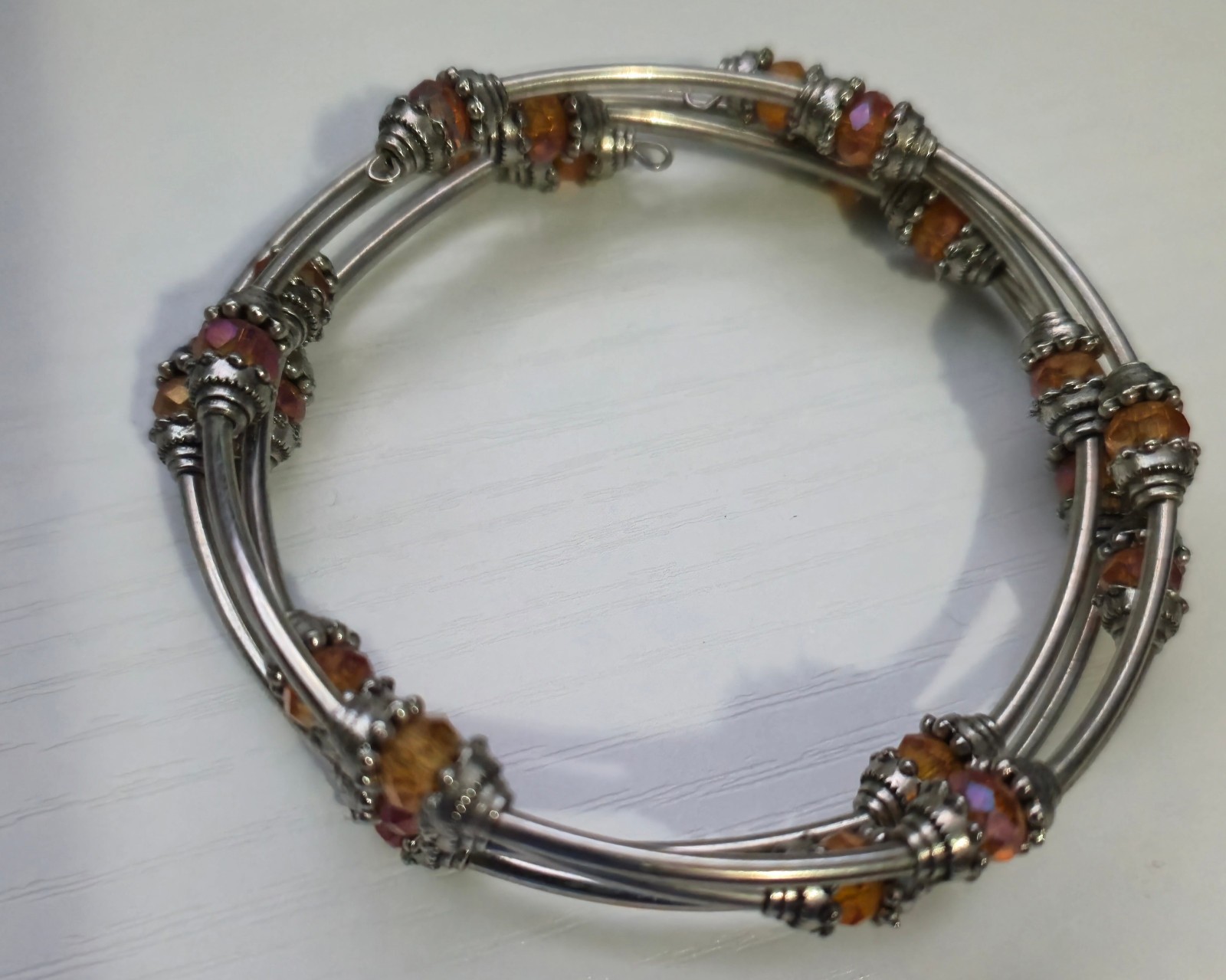 Set of 2 Silver Memory Wire Wrap Bracelets Amber Orange Iridescent Glass Beads