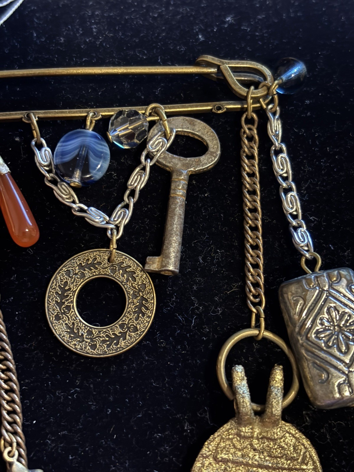Ann Cichon Safety Pin Brooch with Gemstones and Metal Charms Bronze Tone