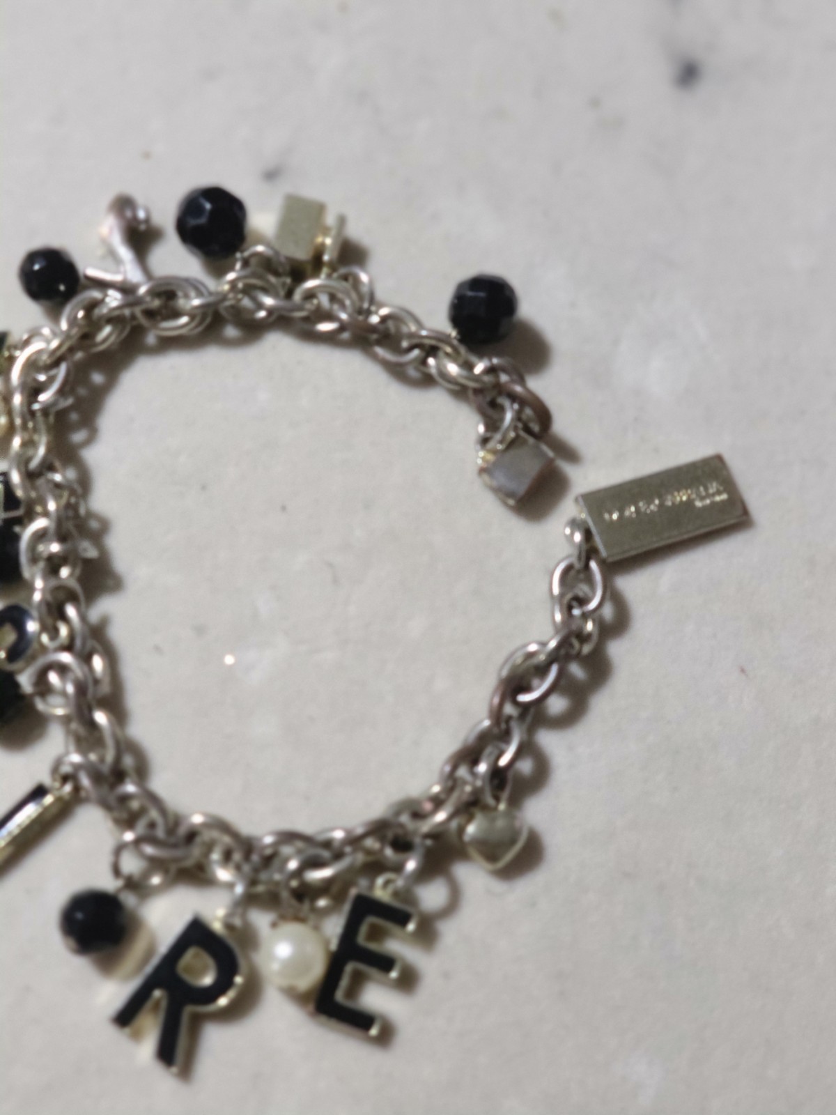 DOLCE AND GABBANA CHARMS BRACELET GOLD TONE DESIRE NEEÐ BRACELET CLASP REPAIR