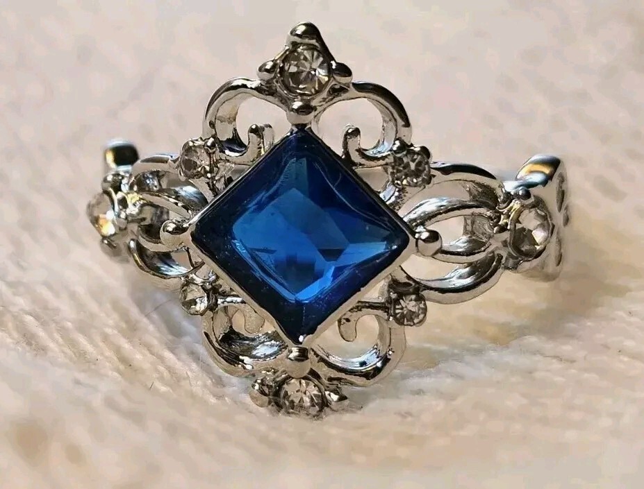 Silver Plated Delicate Noble Pattern Ring with Synthetic Sapphire and Zircons