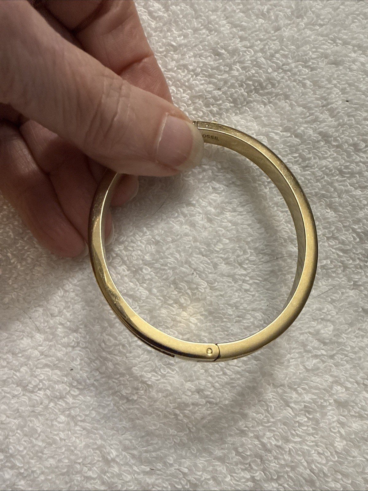 Fossil Brand Gold tone latch closure bangle with white stones