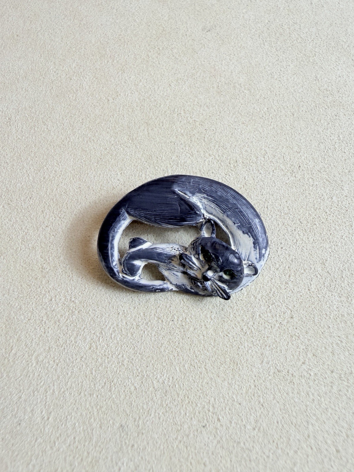 Vintage brooch clay sleeping cat with a brushed black and white finish
