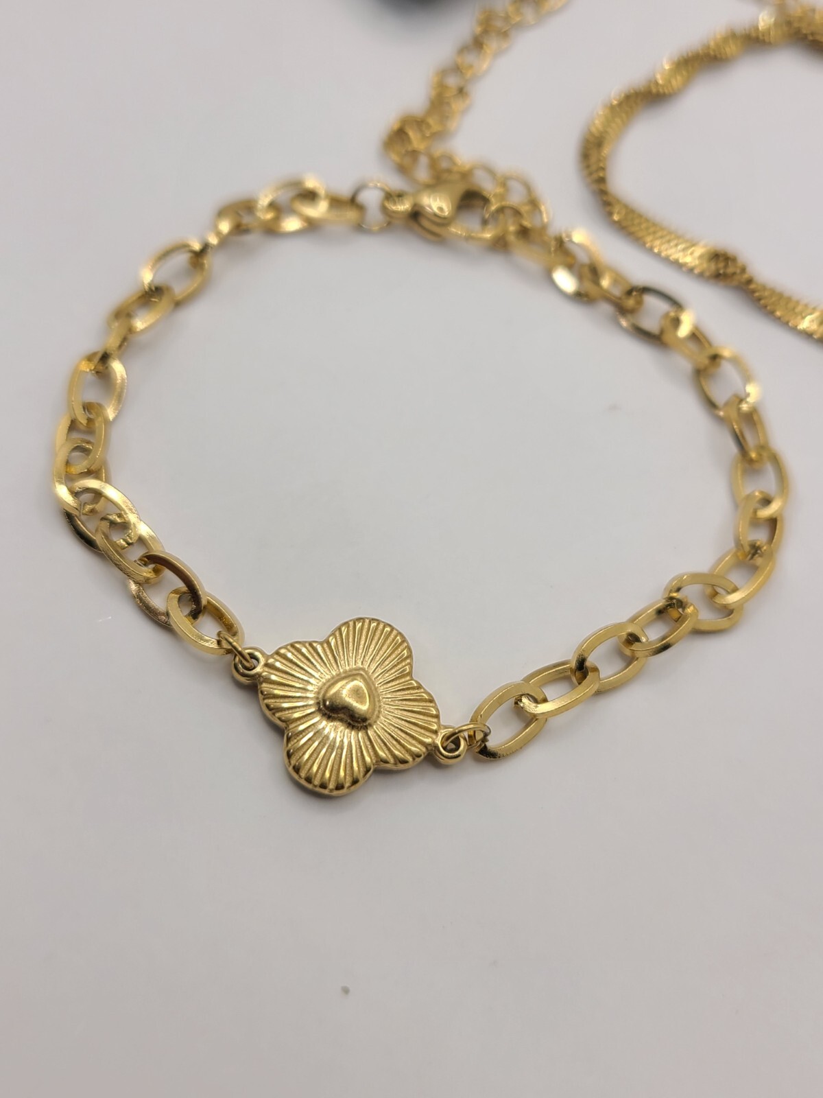 SLIDE Set Of 2 Gold-tone Clover & Twisted Herringbone Bracelets