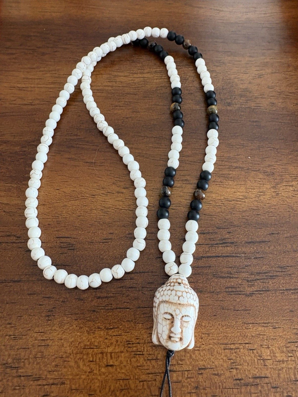 White, Brown & Ivory Look Beaded Necklace With Buddha Head &Tassels