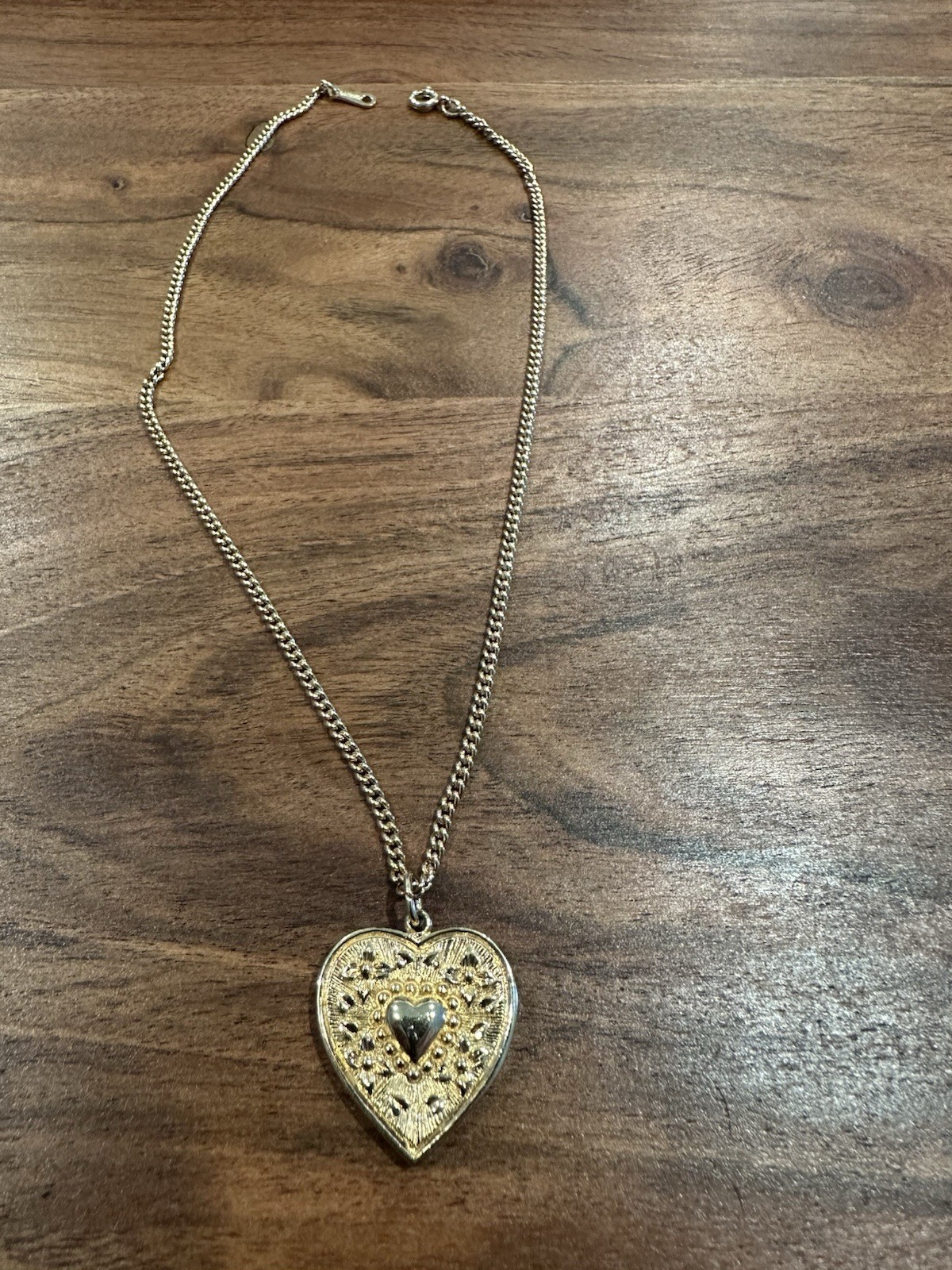Vintage Avon necklace with heart pendant and “I love you” on reverse side.