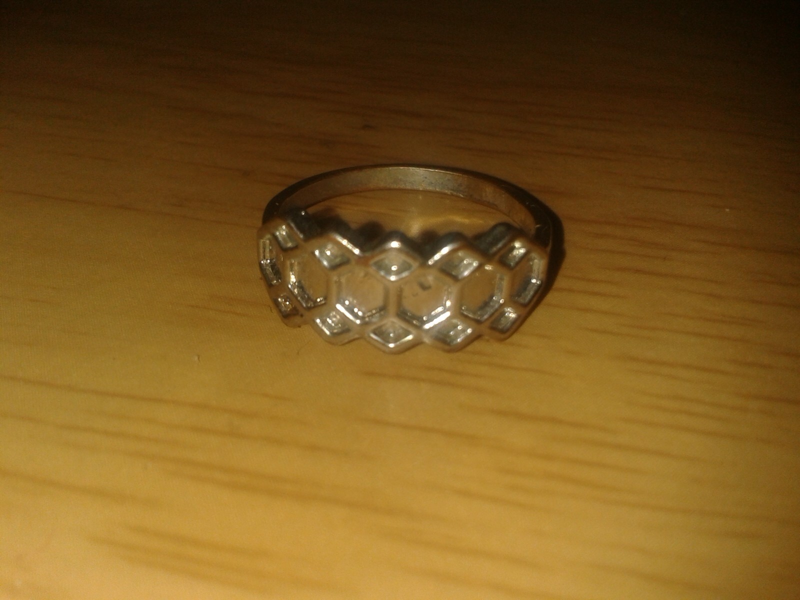 Childrens silver tone hexagon/rhombus design ring. UK size O .(D21d1)