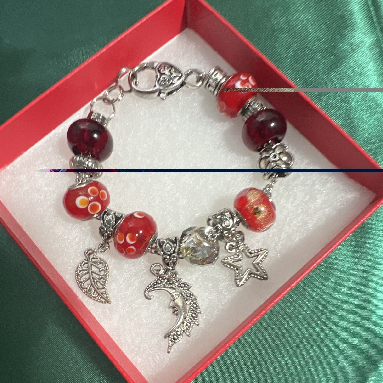 Red Bracelet sterling hand blown glass beads, crystal moon star leaf.