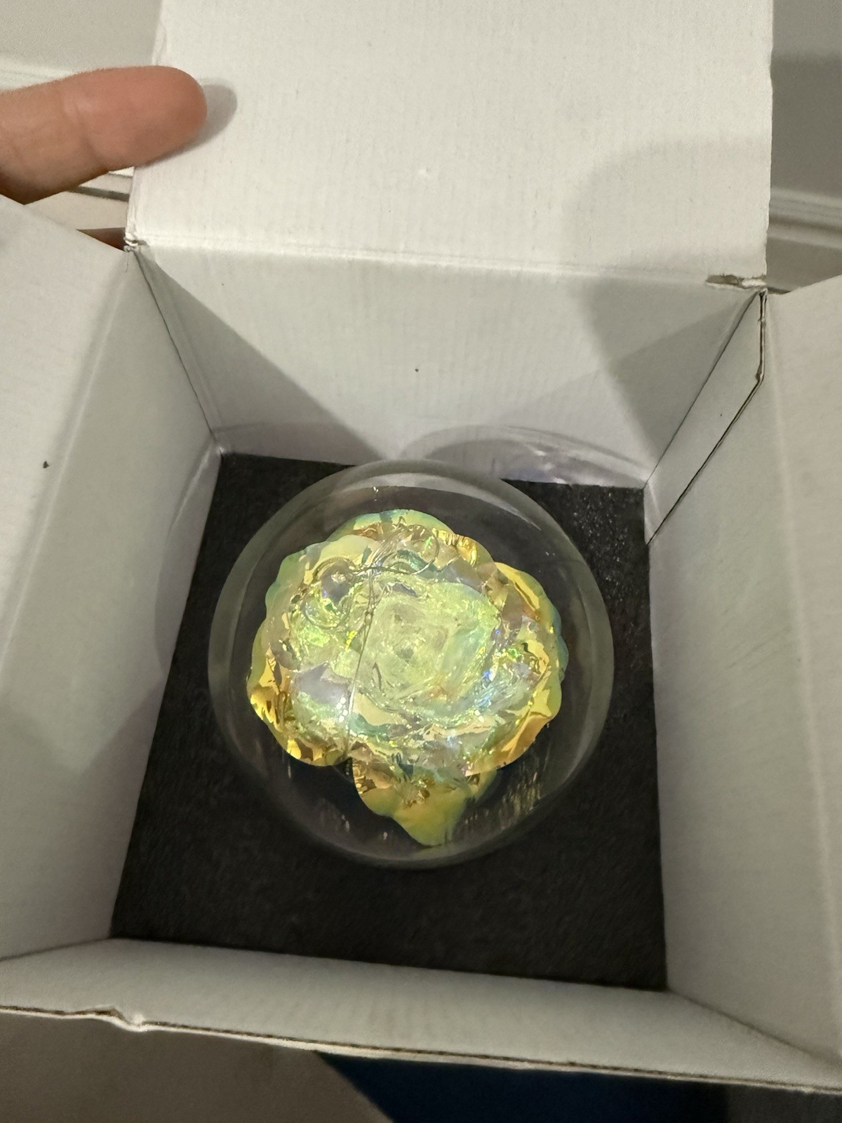 artificial “galaxy” or “eternal” rose in a glass dome with LED lights