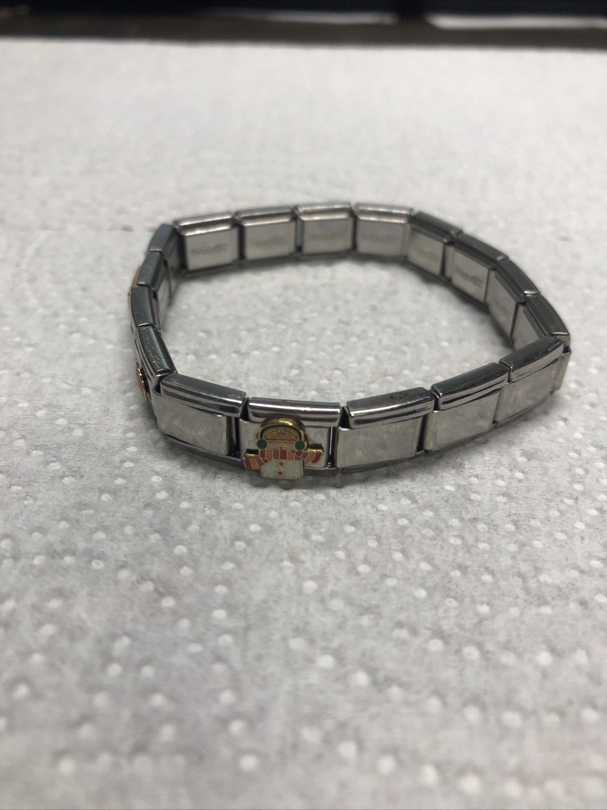 2003- CASA D’ORO ITALIAN STAINLESS STEEL 17 CHARM LINKS STRETCH BRACELET