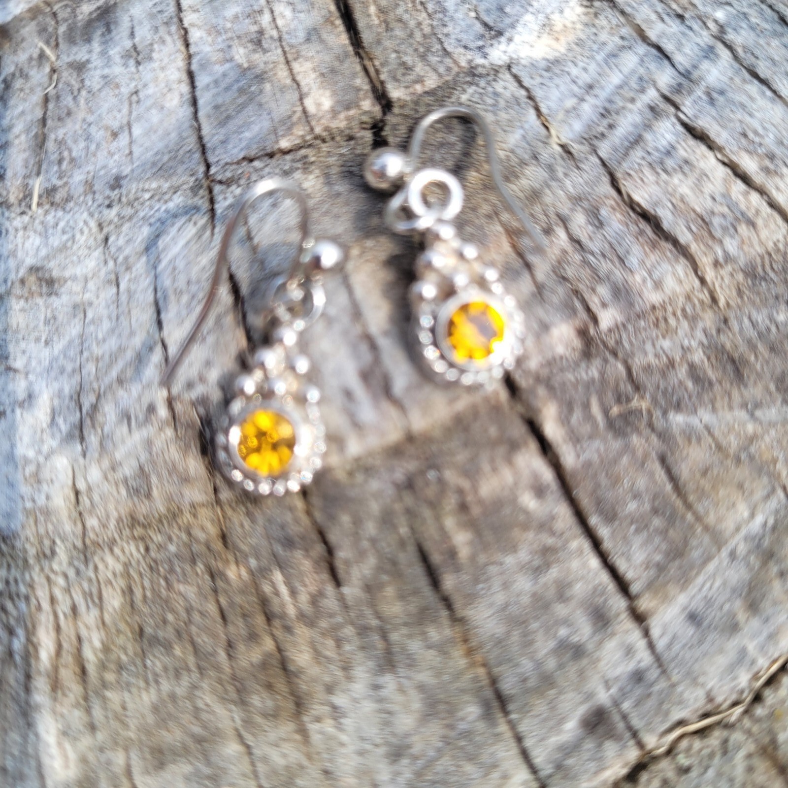 Fancy dangle earings with false gemstones