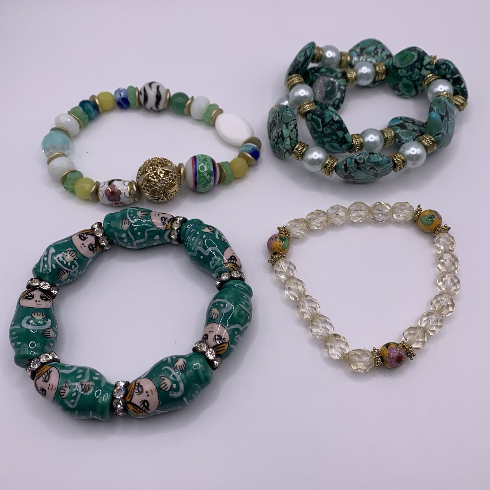 Lot of Four Beaded Bracelets Green Gold Tone Stretch Cloisonné Matryoshka