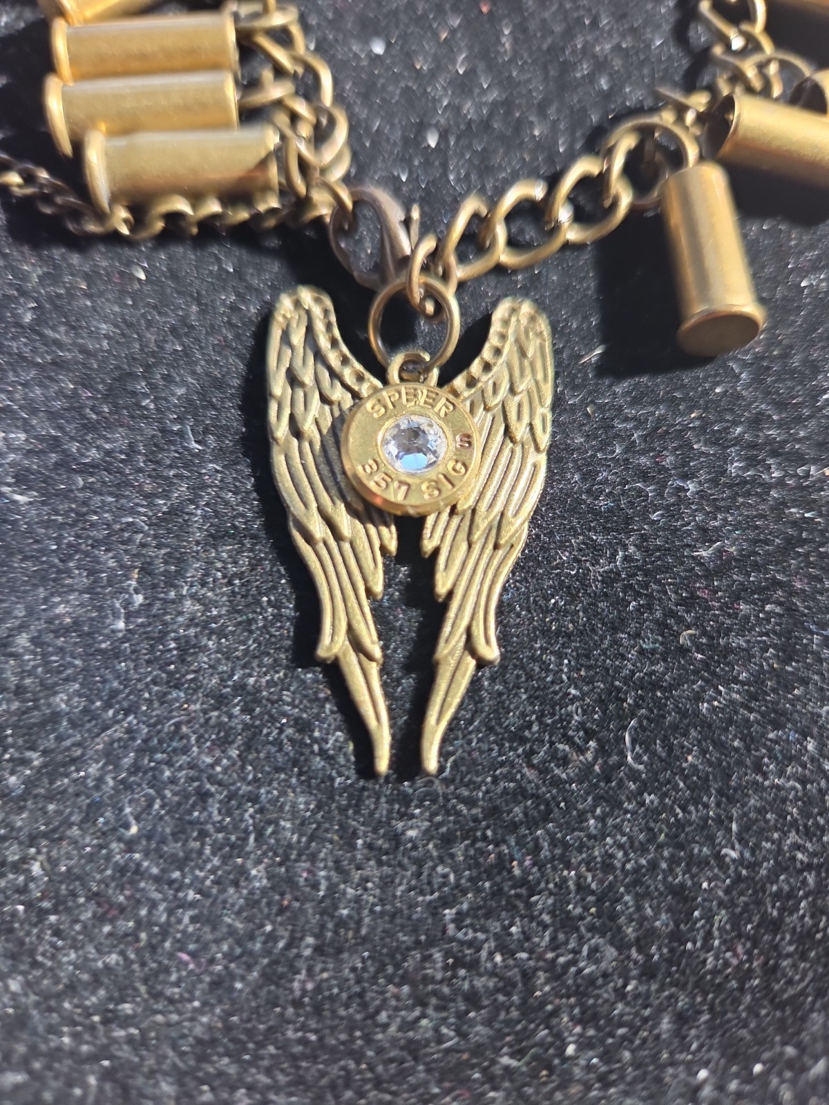 Bullet casing. Bracelet ricelet brass with angel wings