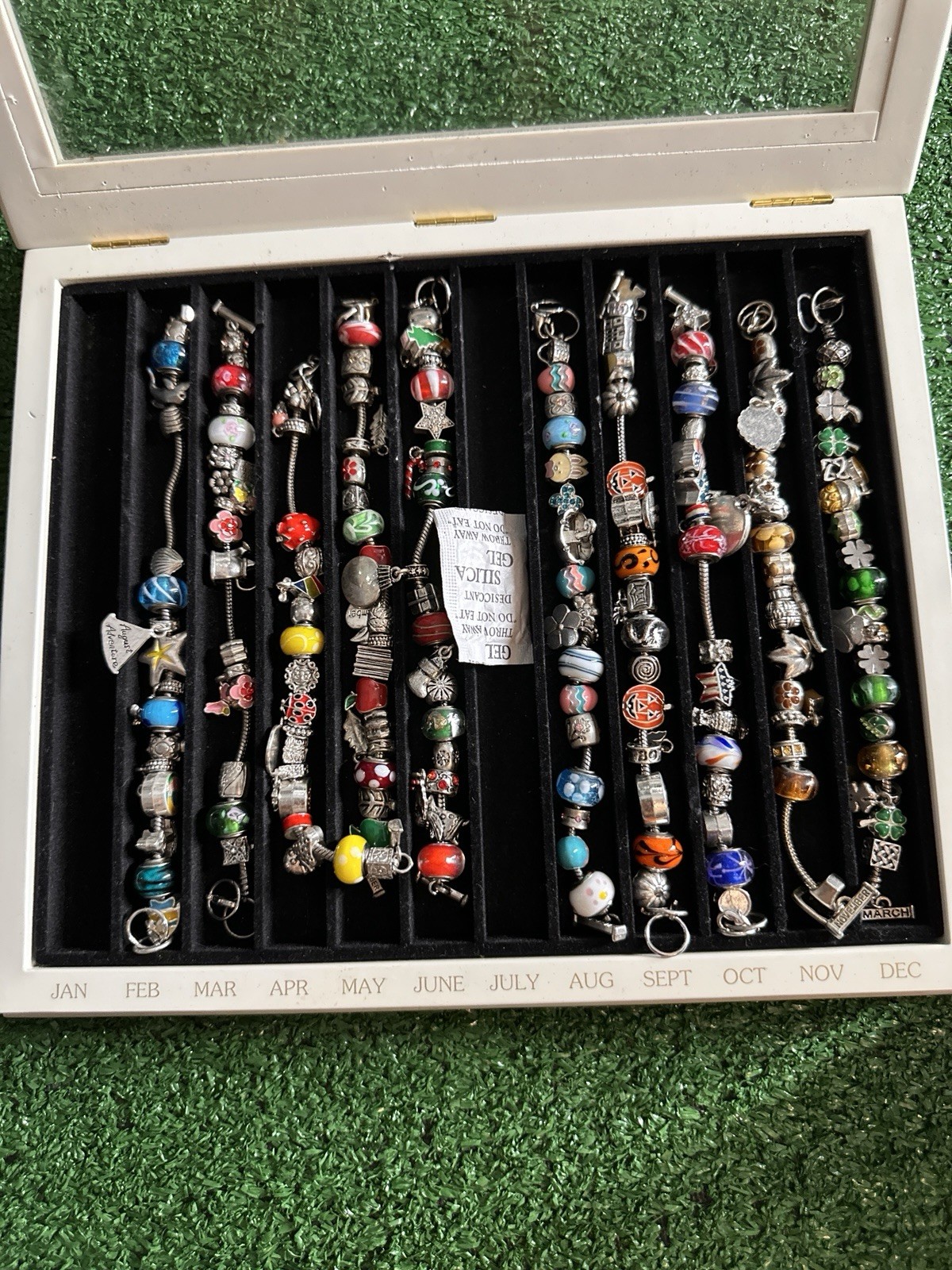 Willabee and Ward 12-Month Holiday Charm Bracelets 11/12 With Case
