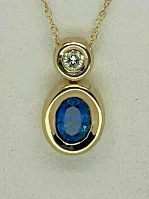 925 Sterling Silver Oval Cut Simulated Sapphire Pendant 14K Yellow Gold Plated