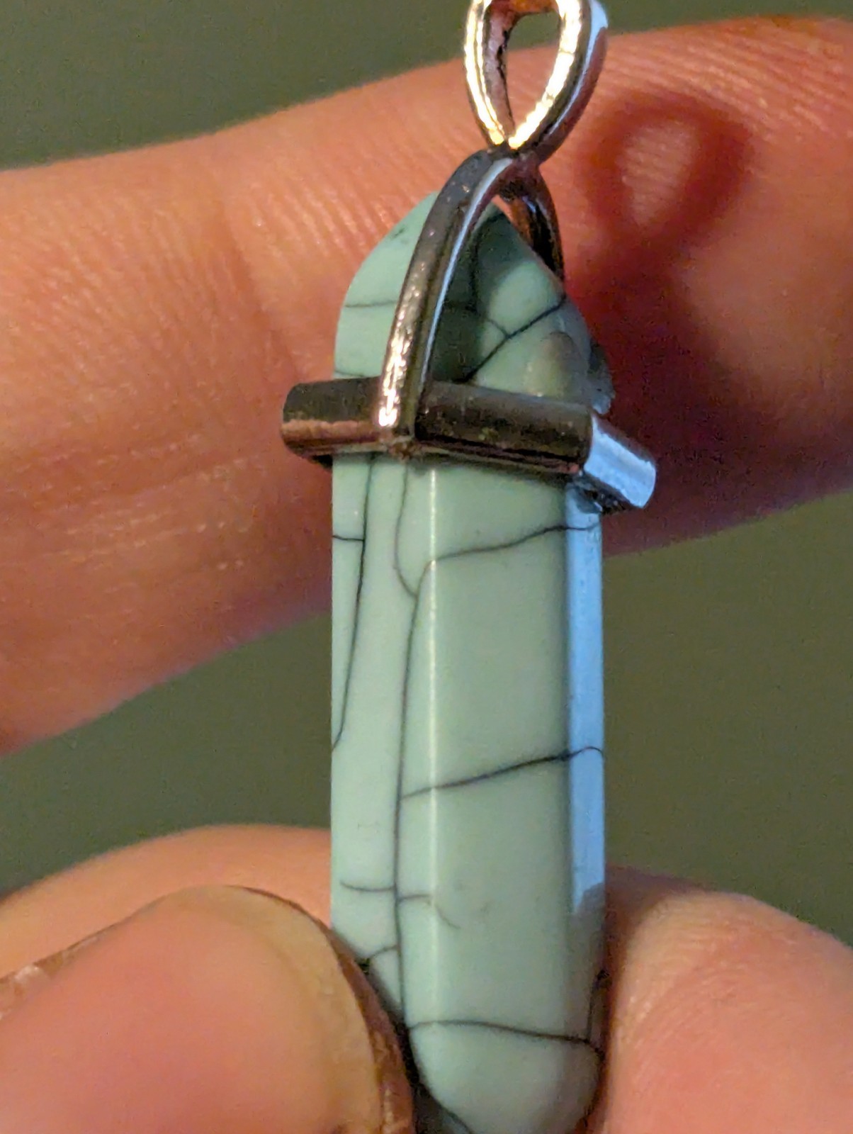 A Turquoise Colored Elongated Pendant (I’m Sure It’s Probably Not Real Turquoise