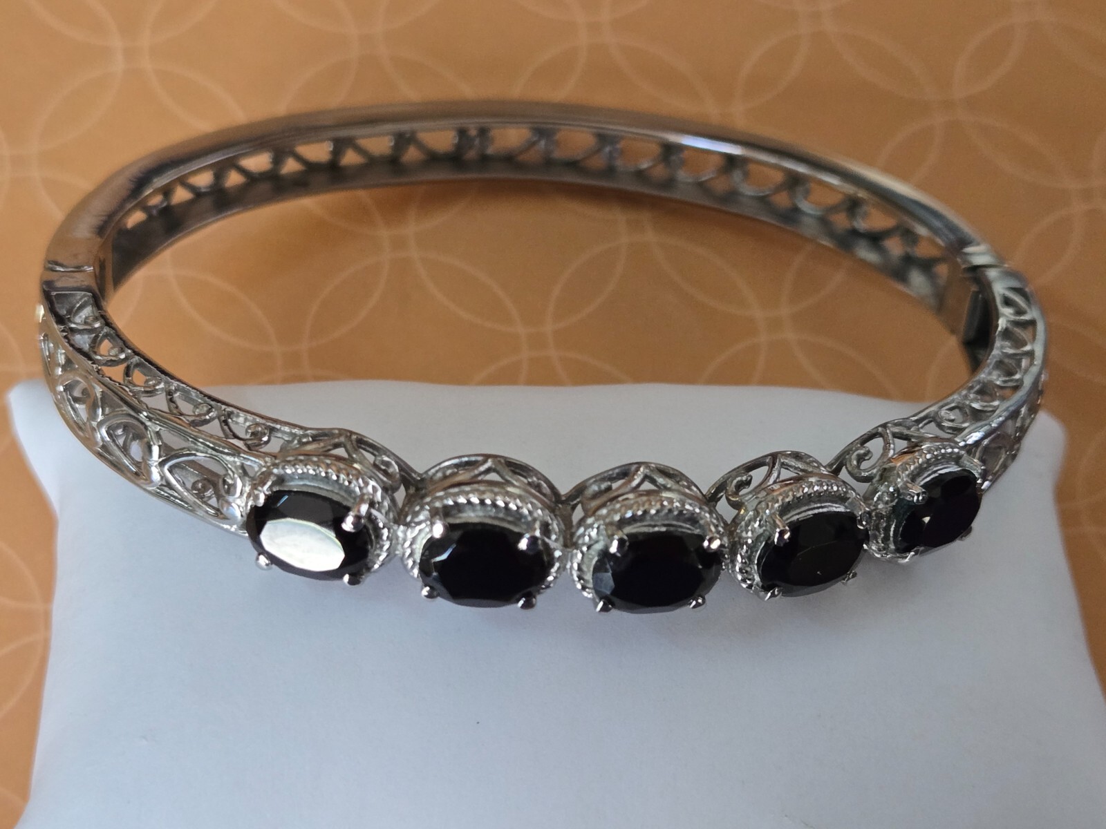 Garnet/ Black Spinel Stainless Steel Heart Design Bangle With Push Lock 7.25 In.