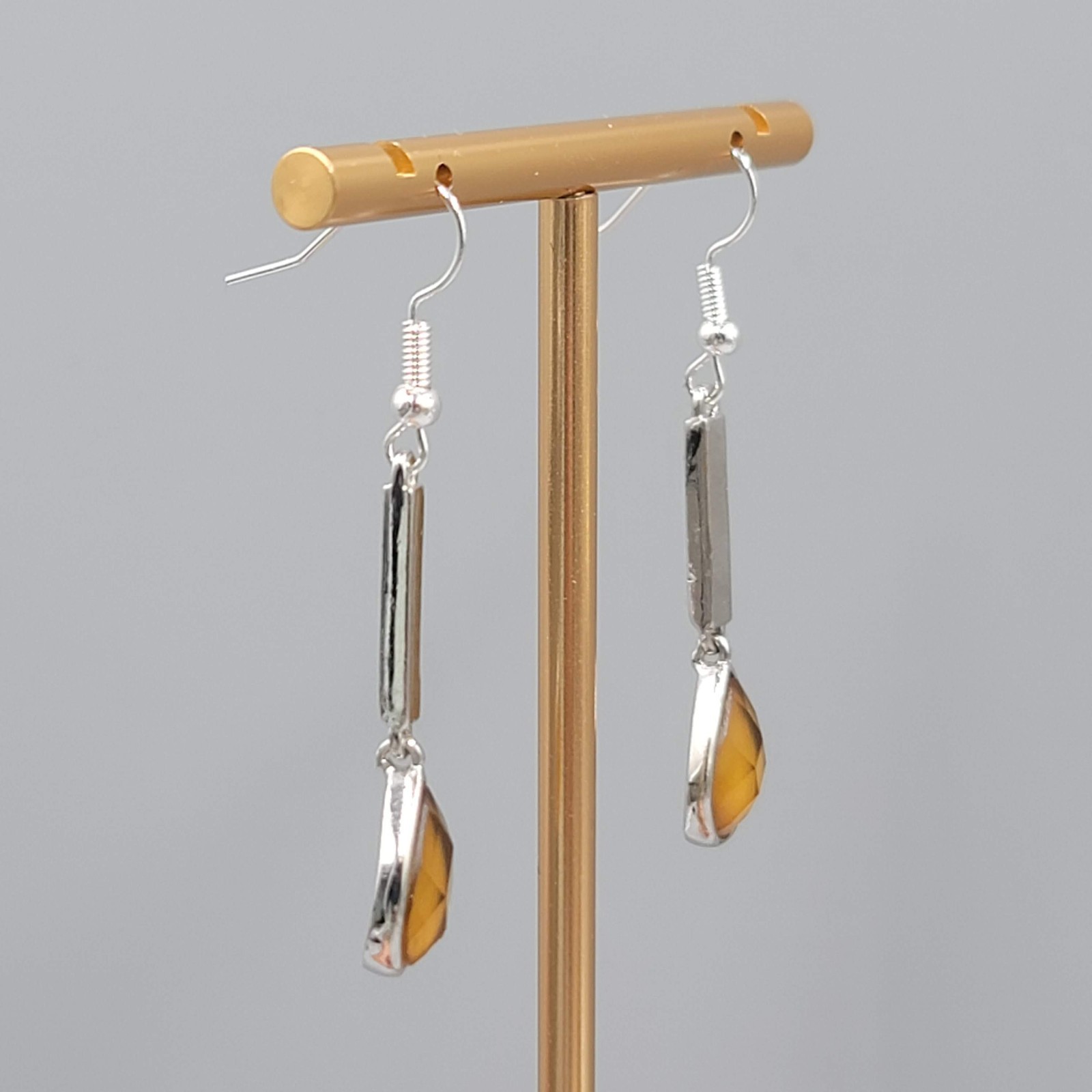 Faceted Yellow Teardrop Pierced Earrings Silver tone Dangle 2 3/8 in
