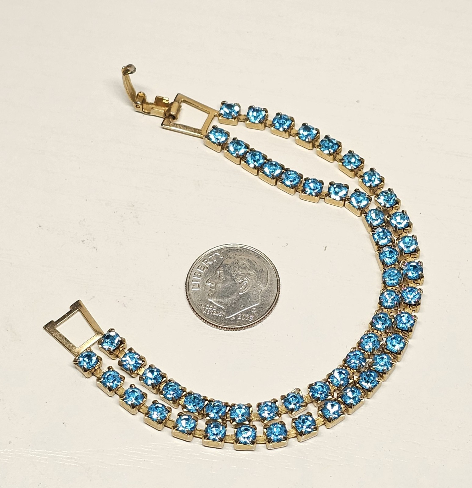 Blue Rhinestone Bracelet Gold Tone Fold Over Clasp Size 6 1/2″