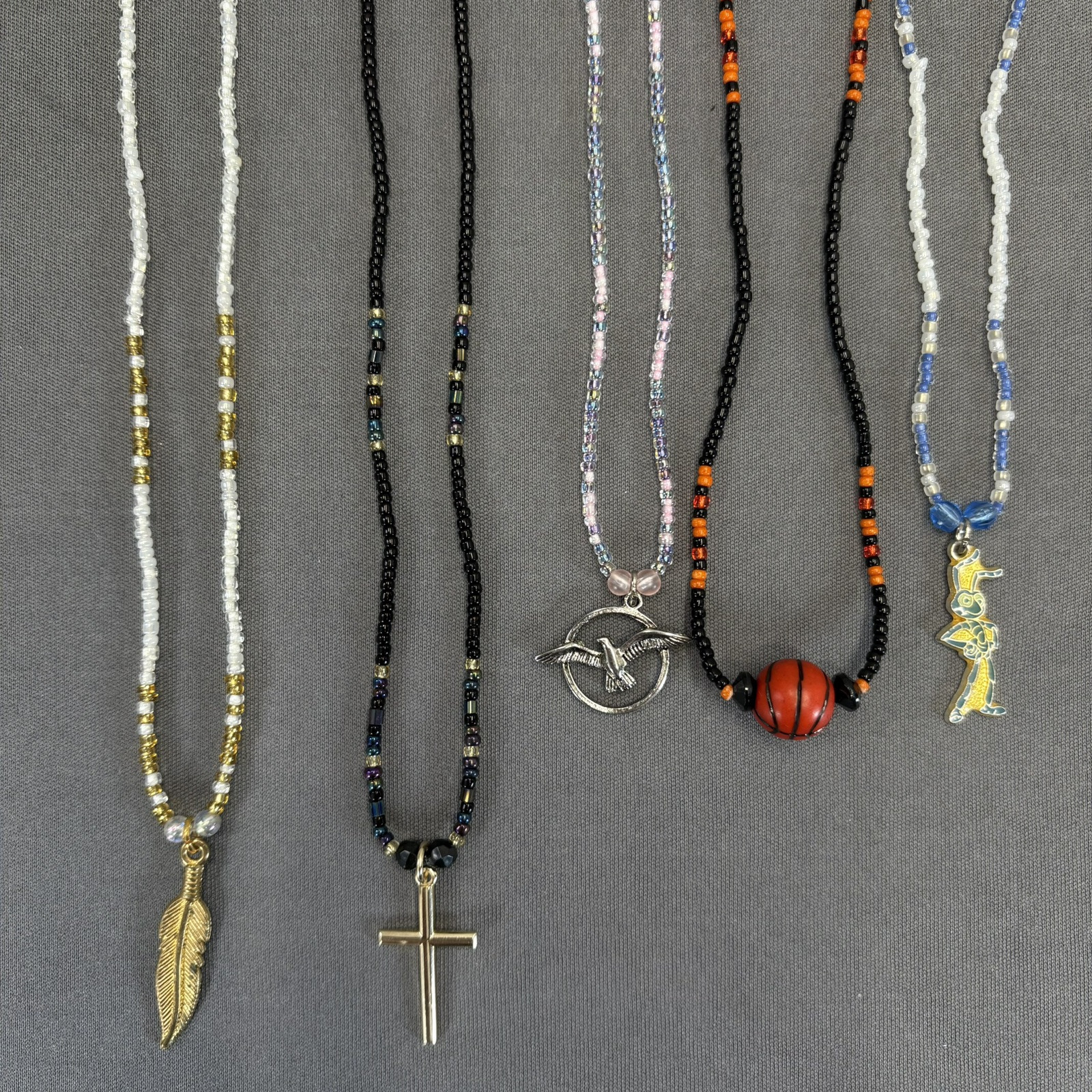 Seed Bead Pendant Necklaces Lot of 5 Multicolor Cross Sports Bugs Life Disney