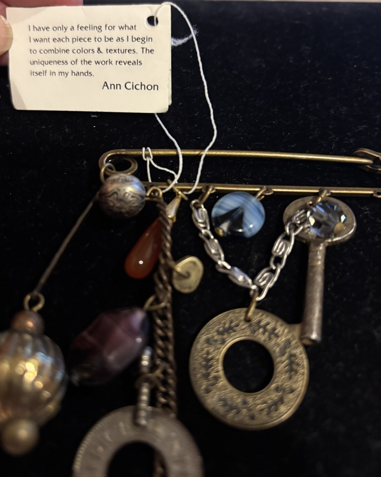 Ann Cichon Safety Pin Brooch with Gemstones and Metal Charms Bronze Tone