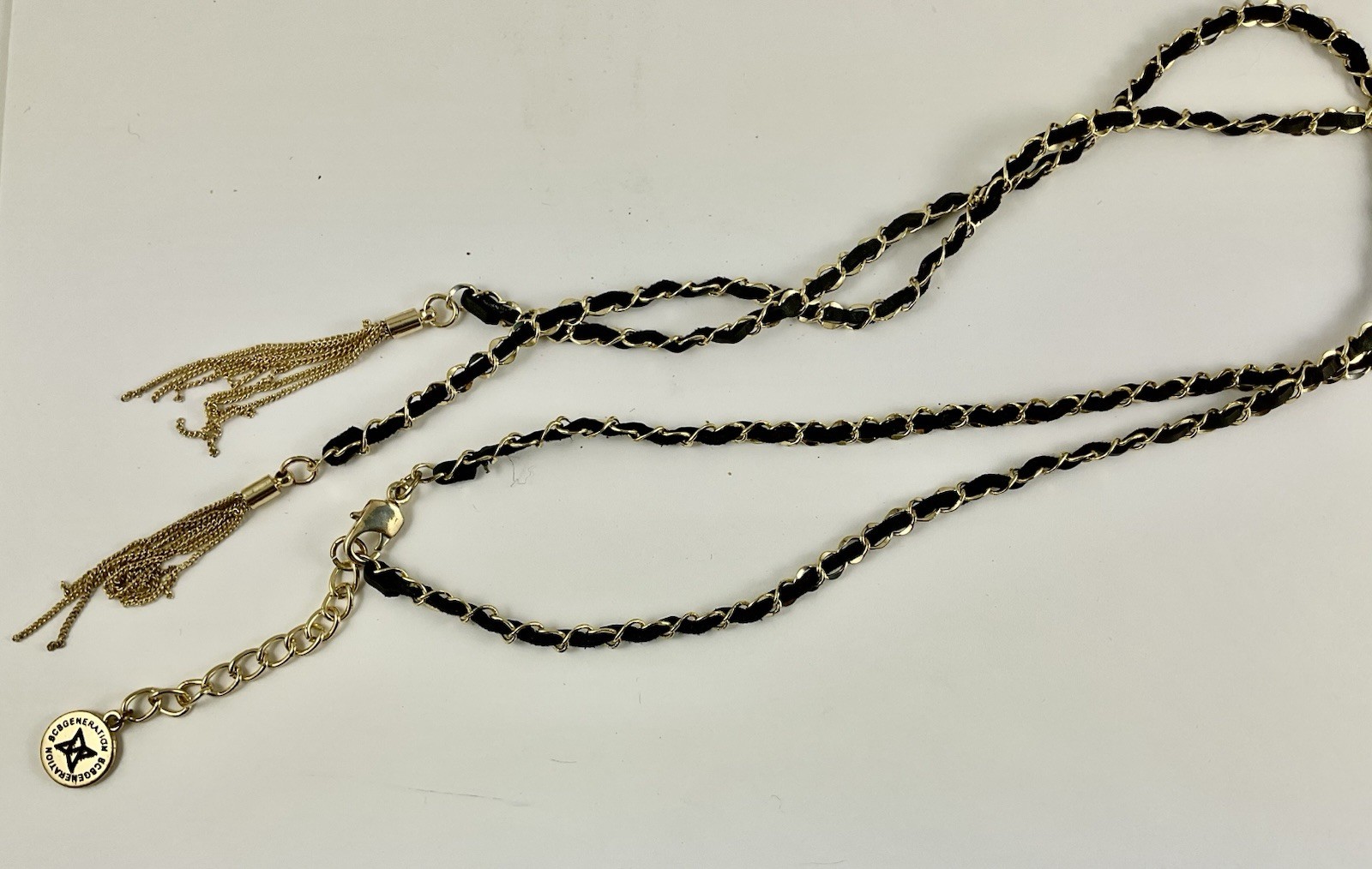 BCBGeneration Golden W Black Suede Woven 26” Tassle Necklace