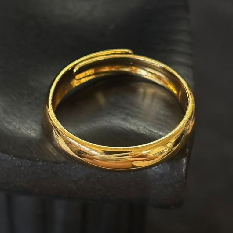 Simple Band Ring Gold-plated (NOT SURE) marked ‘ 999 ‘, Size 9 adjustable