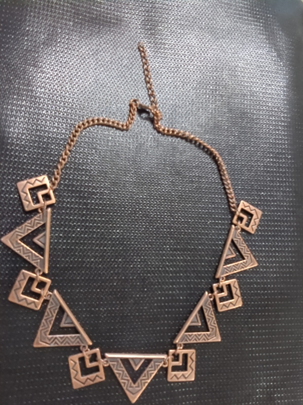 Paparazzi Giza Goals necklace featuring copper triangular frames with patterns