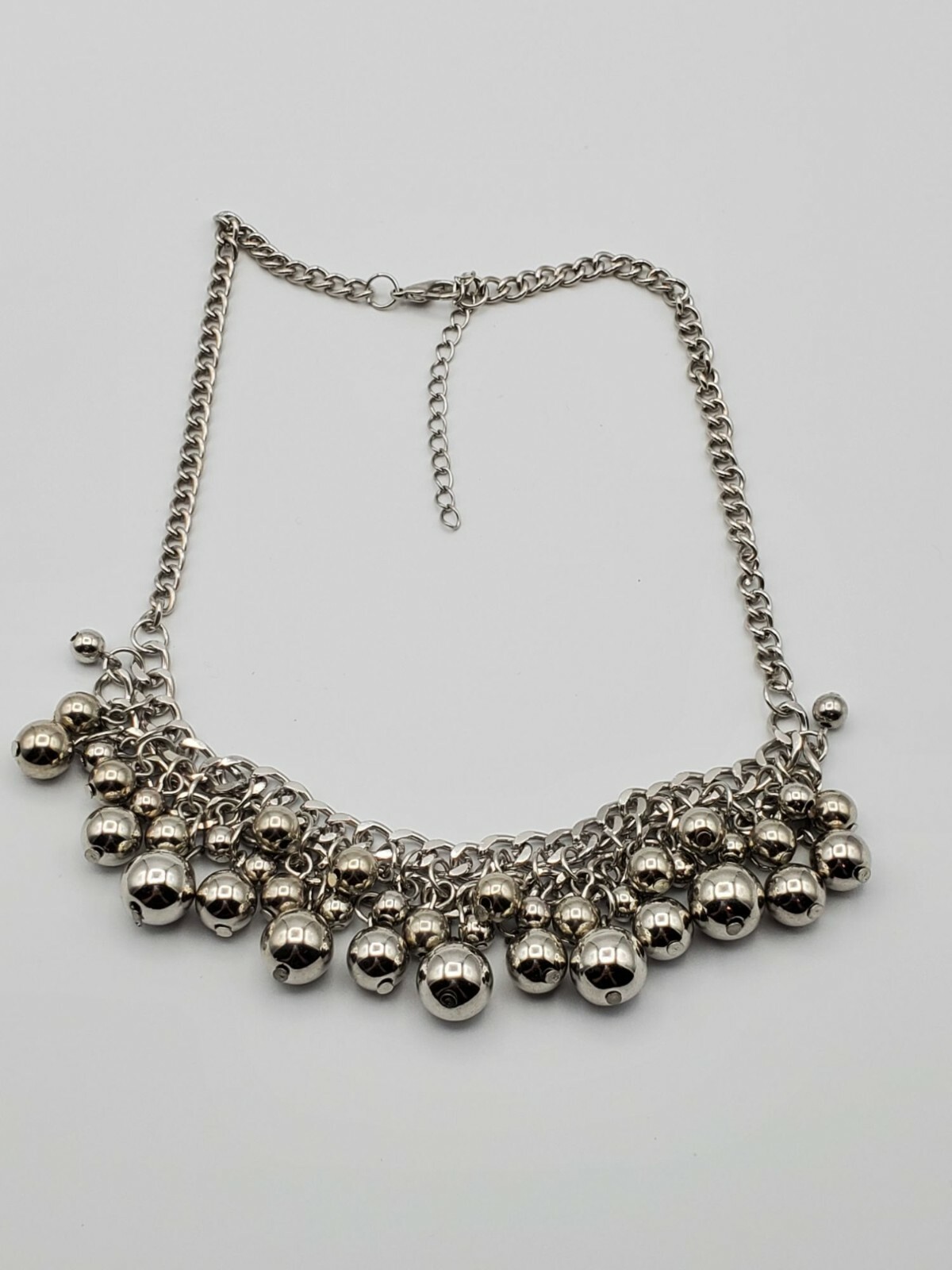 Silver tone dangle drop beaded chain bib necklace