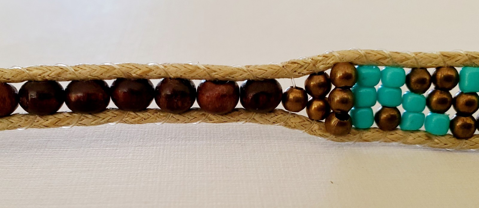 Lotus & Luna 21 inch string & bead necklace. Brown with turquoise accent beads.