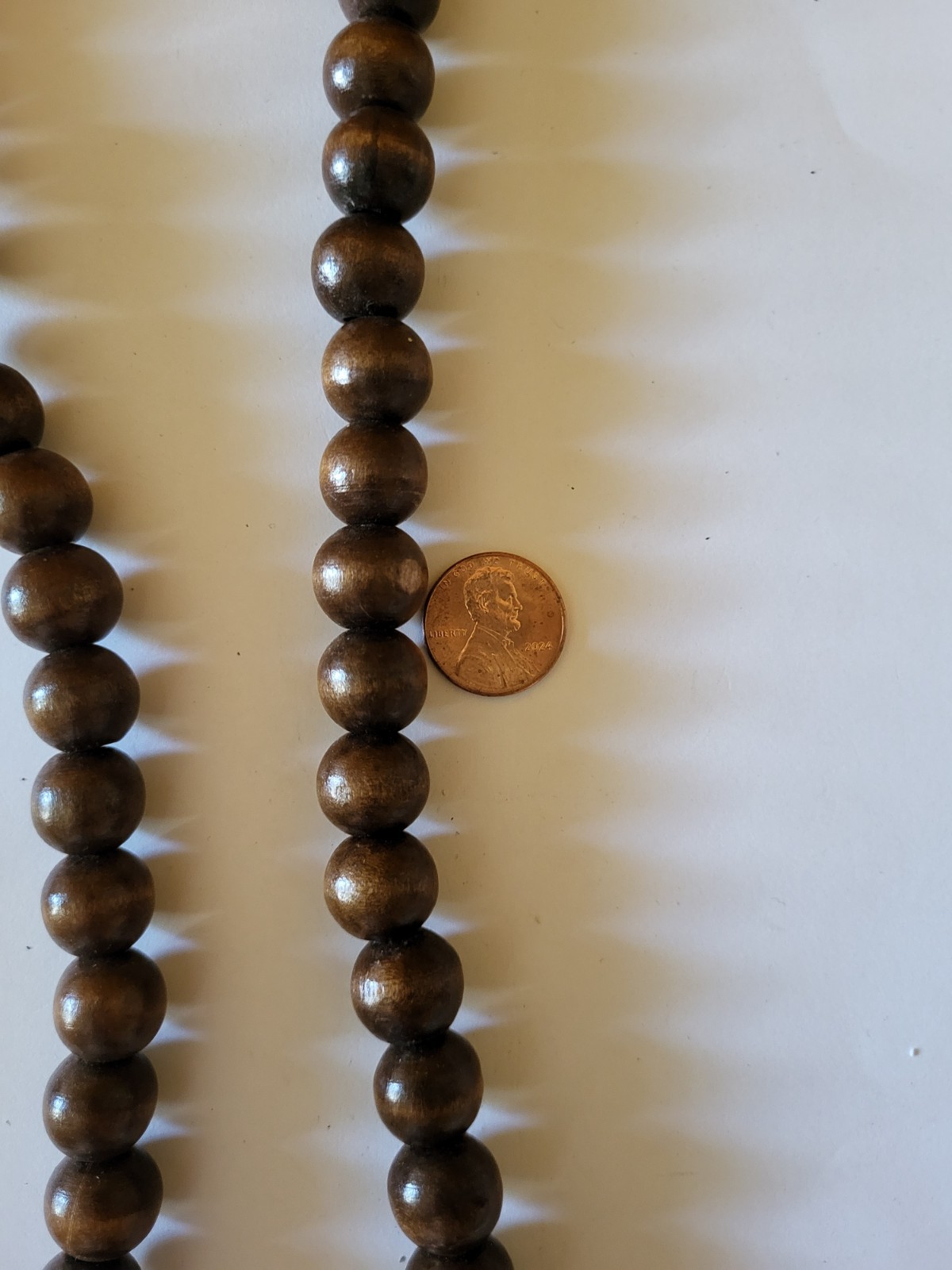 Long wooden bead necklace made of dark brown beads 37in