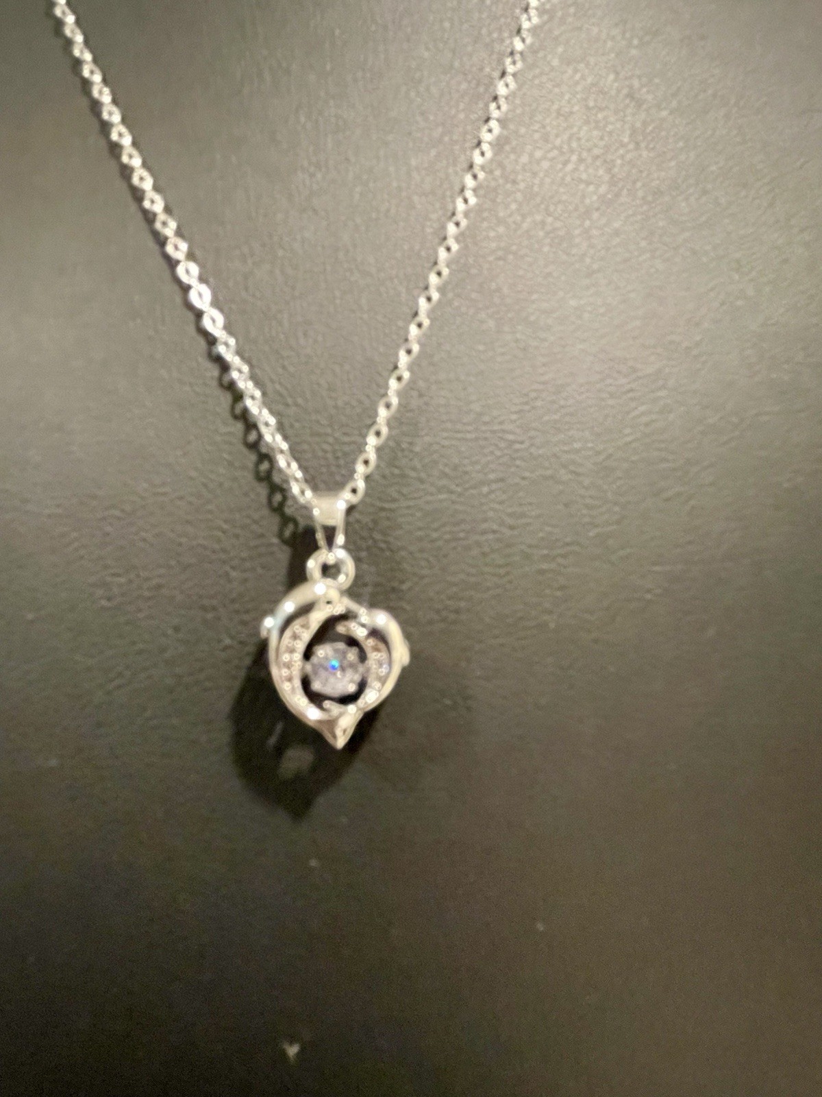 Dolphin Pendant Necklace with Clear Gemstones in Silver and Dancing Middle Gem