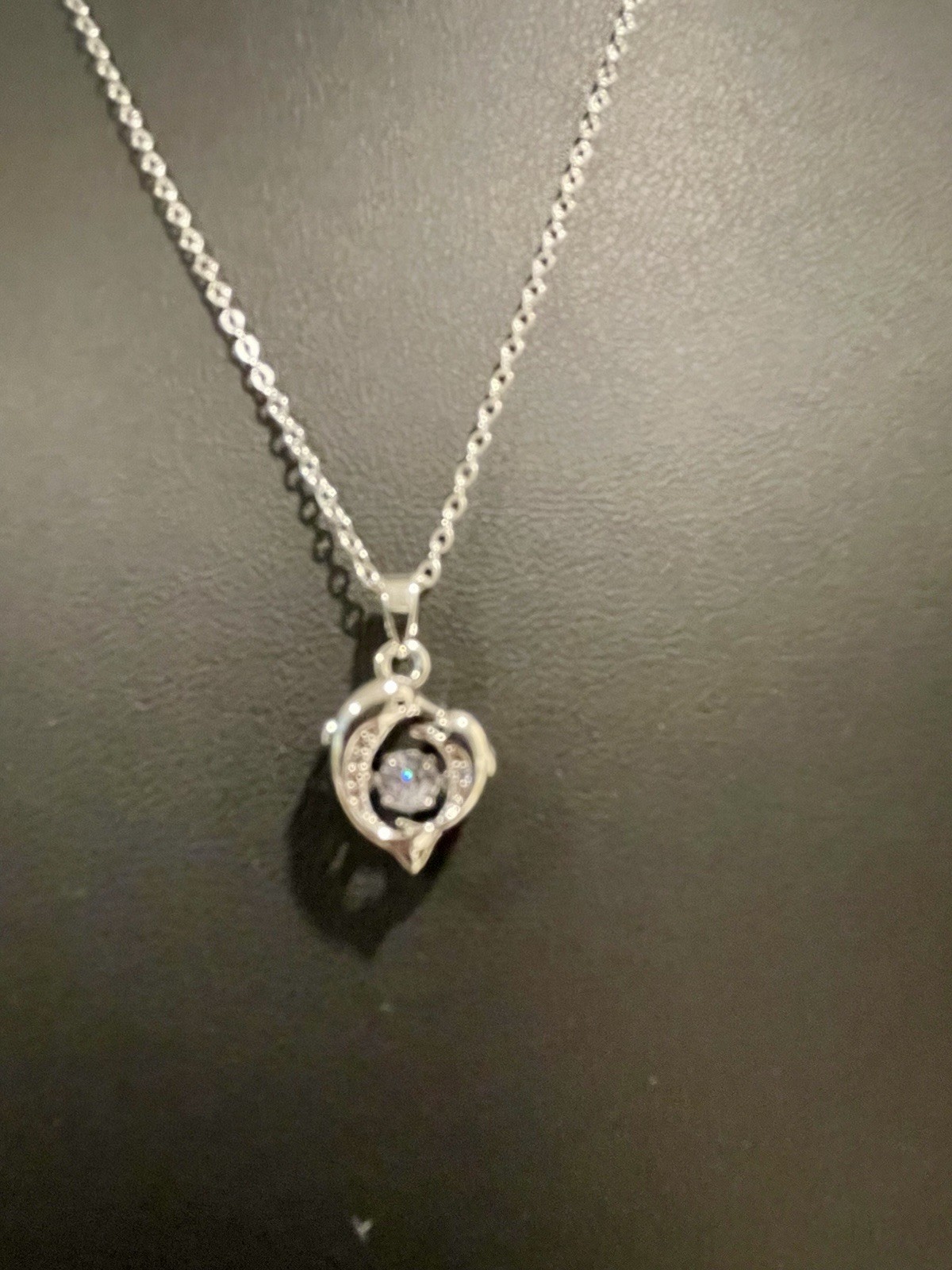 Dolphin Pendant Necklace with Clear Gemstones in Silver and Dancing Middle Gem