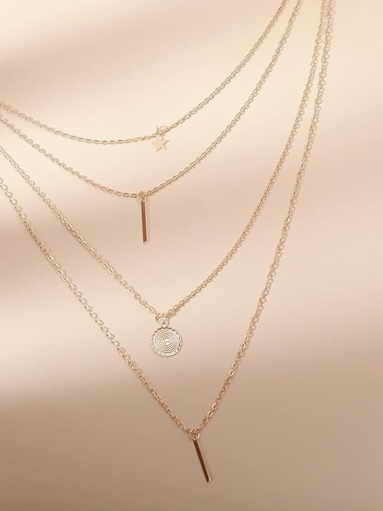 Four (4) Layered Multi Chain Gold Necklace, Column, Pendant and Star