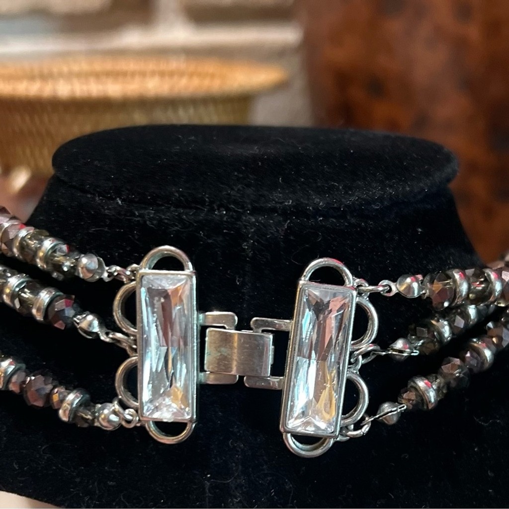 GUC- Iridescent beautiful 3 strand necklace with a fold over clasp.