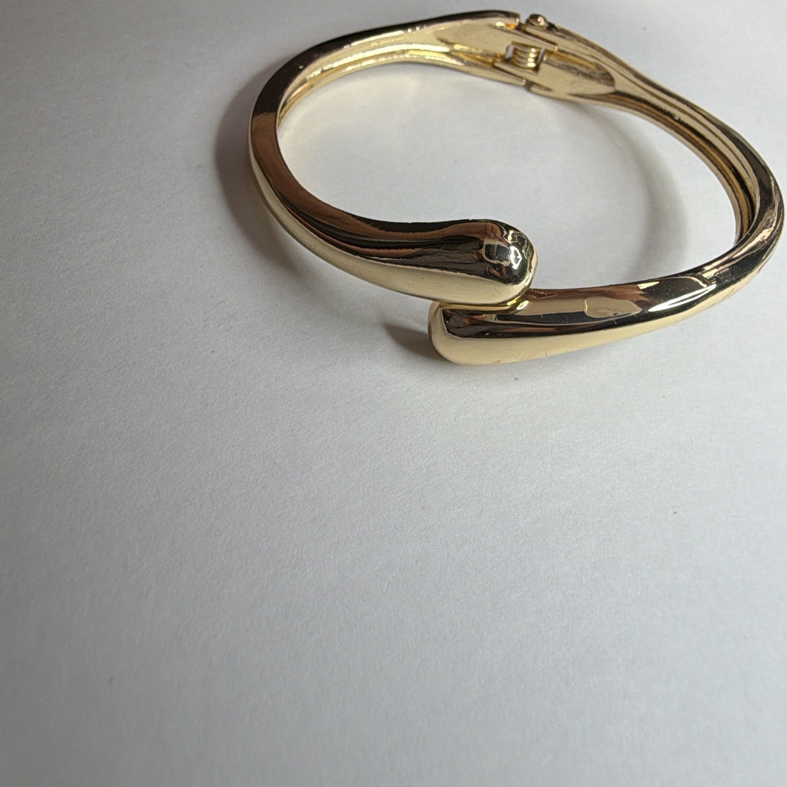 Gold Tone Asymmetrical Bangle Bracelet, Push Lock Closure, No Stone