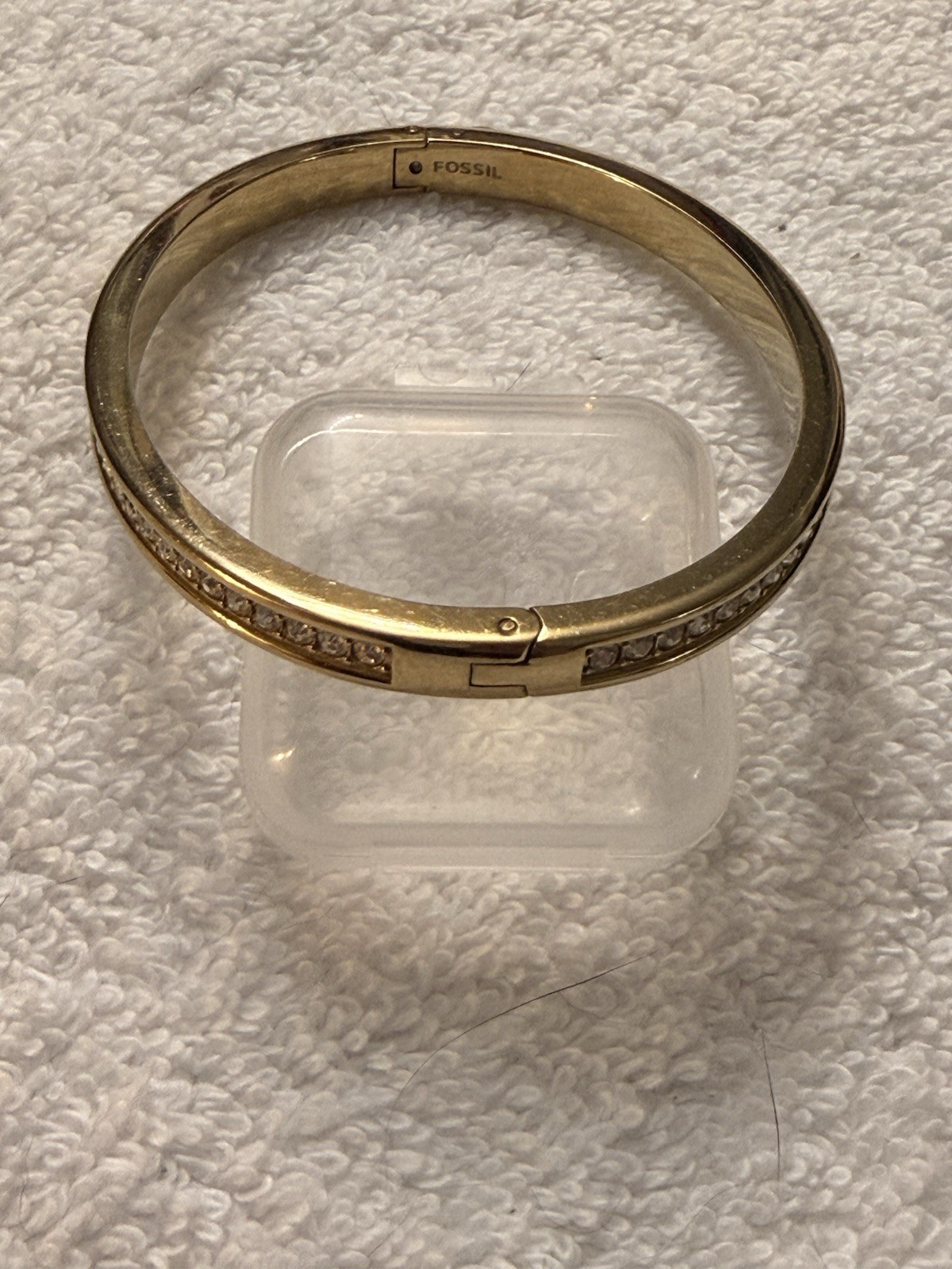 Fossil Brand Gold tone latch closure bangle with white stones