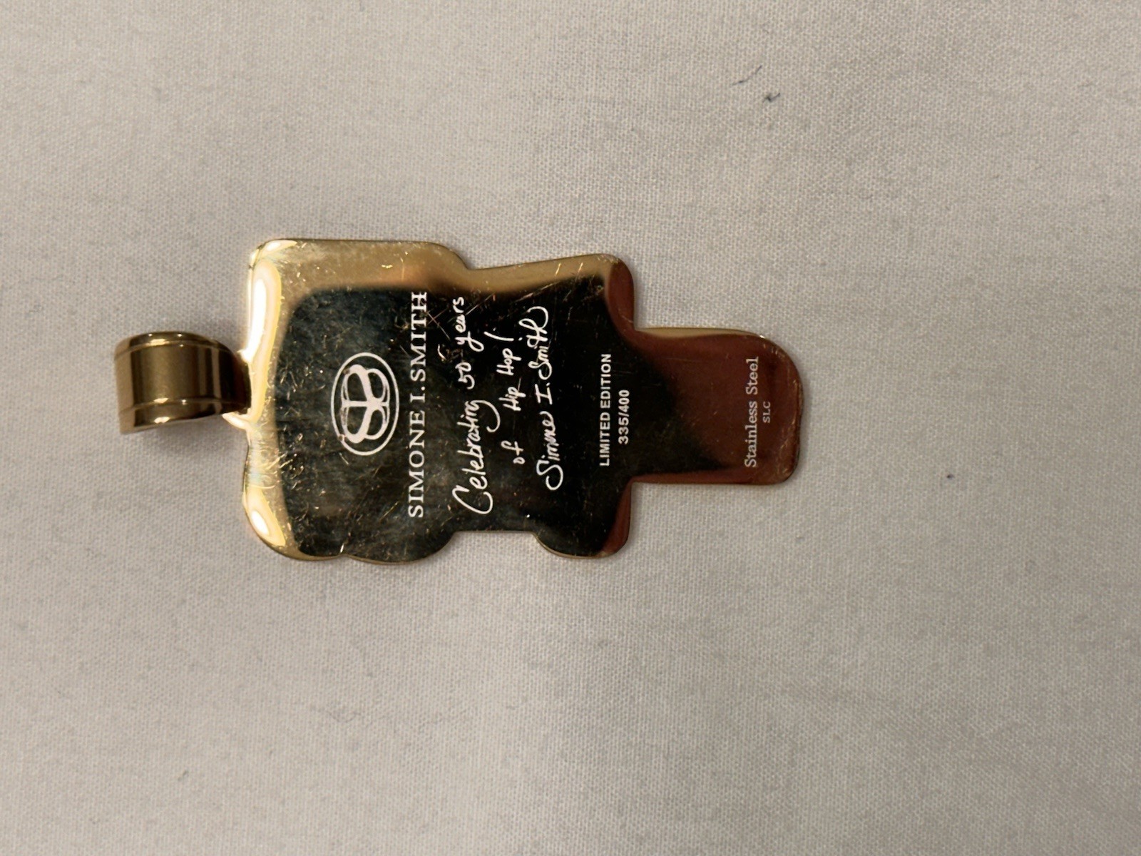 “Simone I. Smith Celebrity 50 years of Hip Hop pendant”