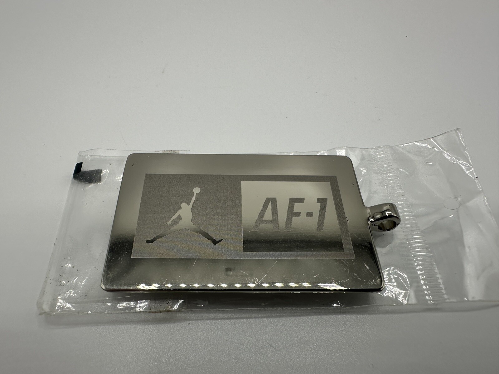 AF-1 Michael Jordan Nike Pendant, Dog Tag, Keychain Metal & White Jump Man Logo