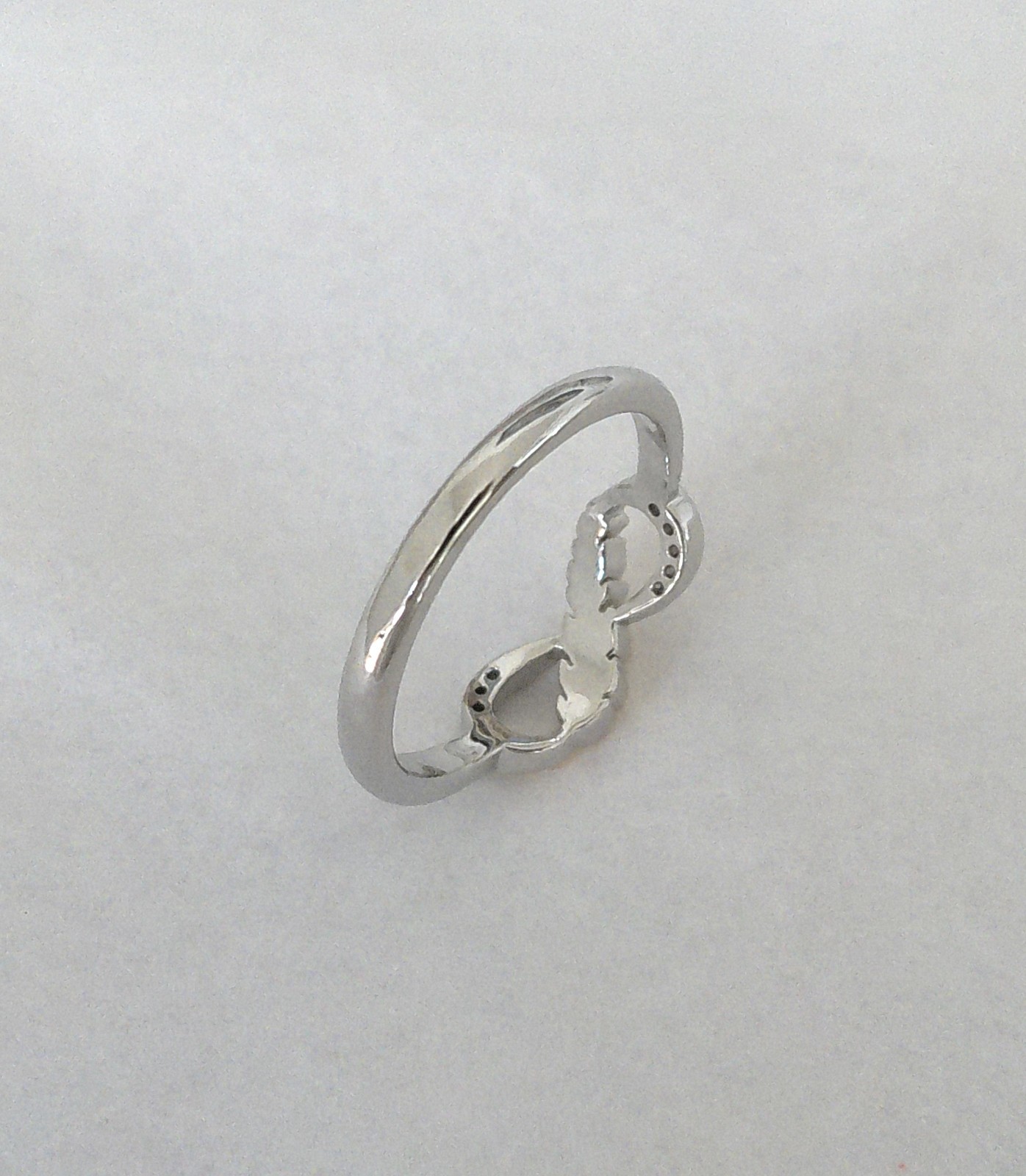 New Silvertone Eternal Infinity Loop with Goldtone Feather Accent Ring Size 7.75