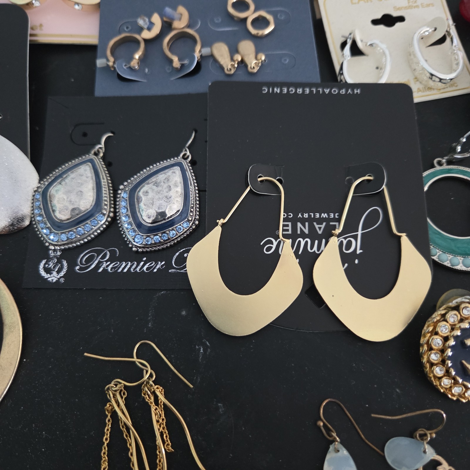 Lot of New & Used Earrings . Mixed colors and models.