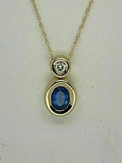 925 Sterling Silver Oval Cut Simulated Sapphire Pendant 14K Yellow Gold Plated
