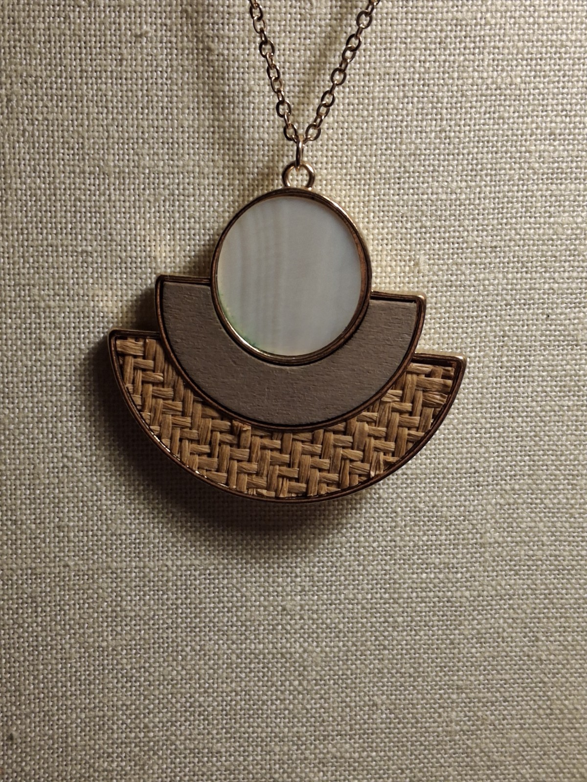 Pre-owned no brand long metal pendant with MOP, tan metal and woven straw