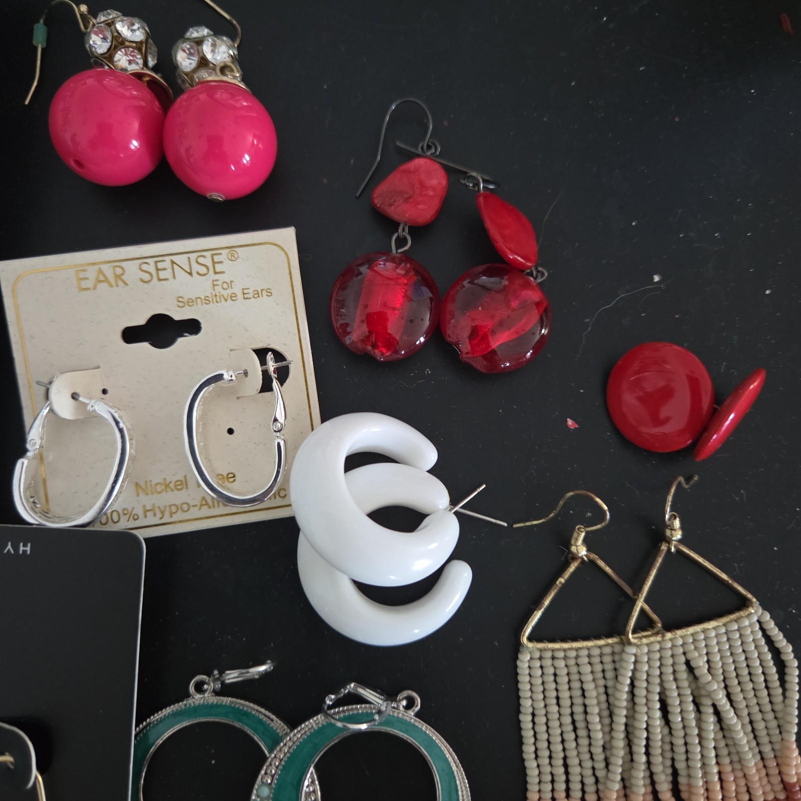 Lot of New & Used Earrings . Mixed colors and models.