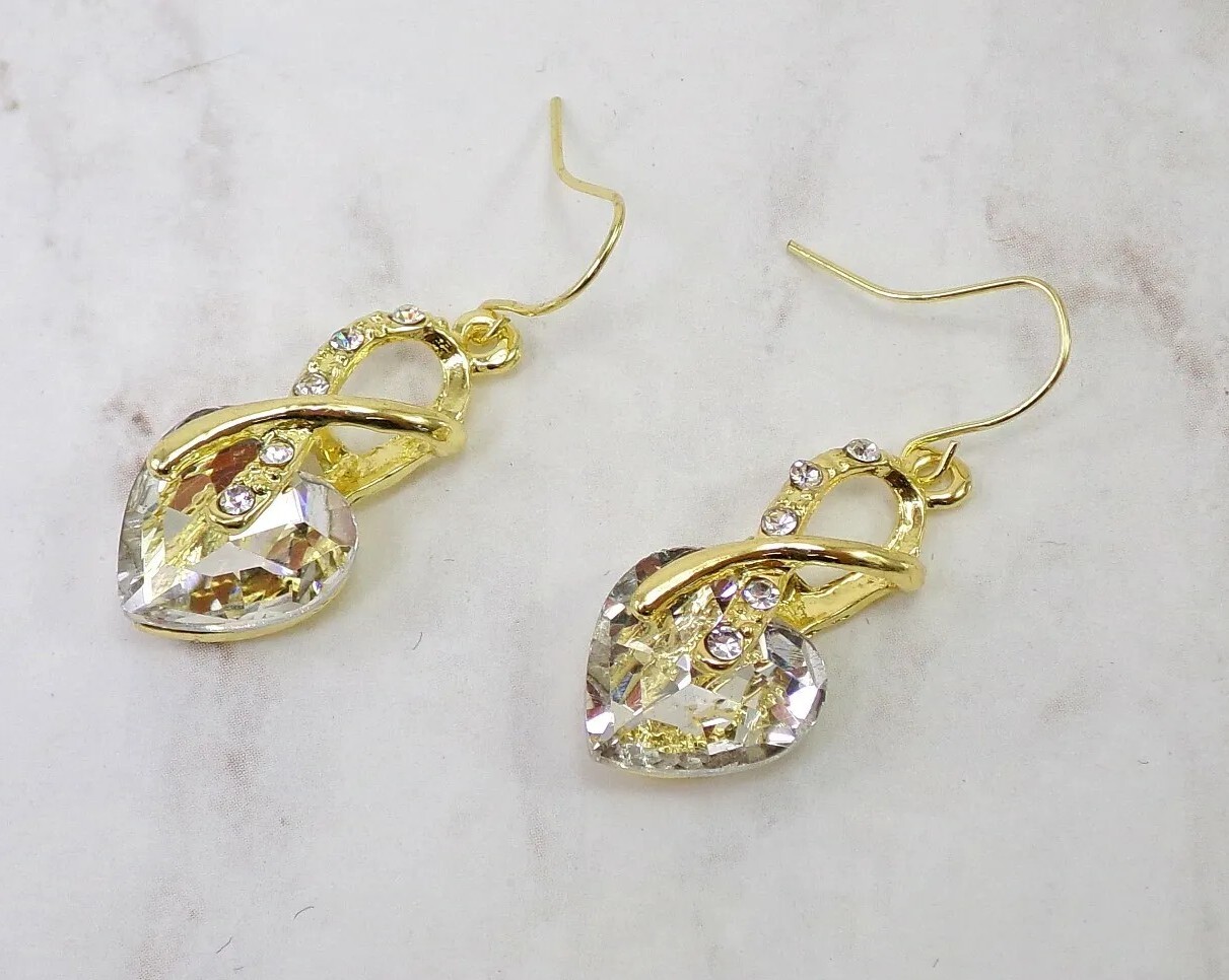 Clear crystal heart earrings in an aurora borealis finish gold wrap front New