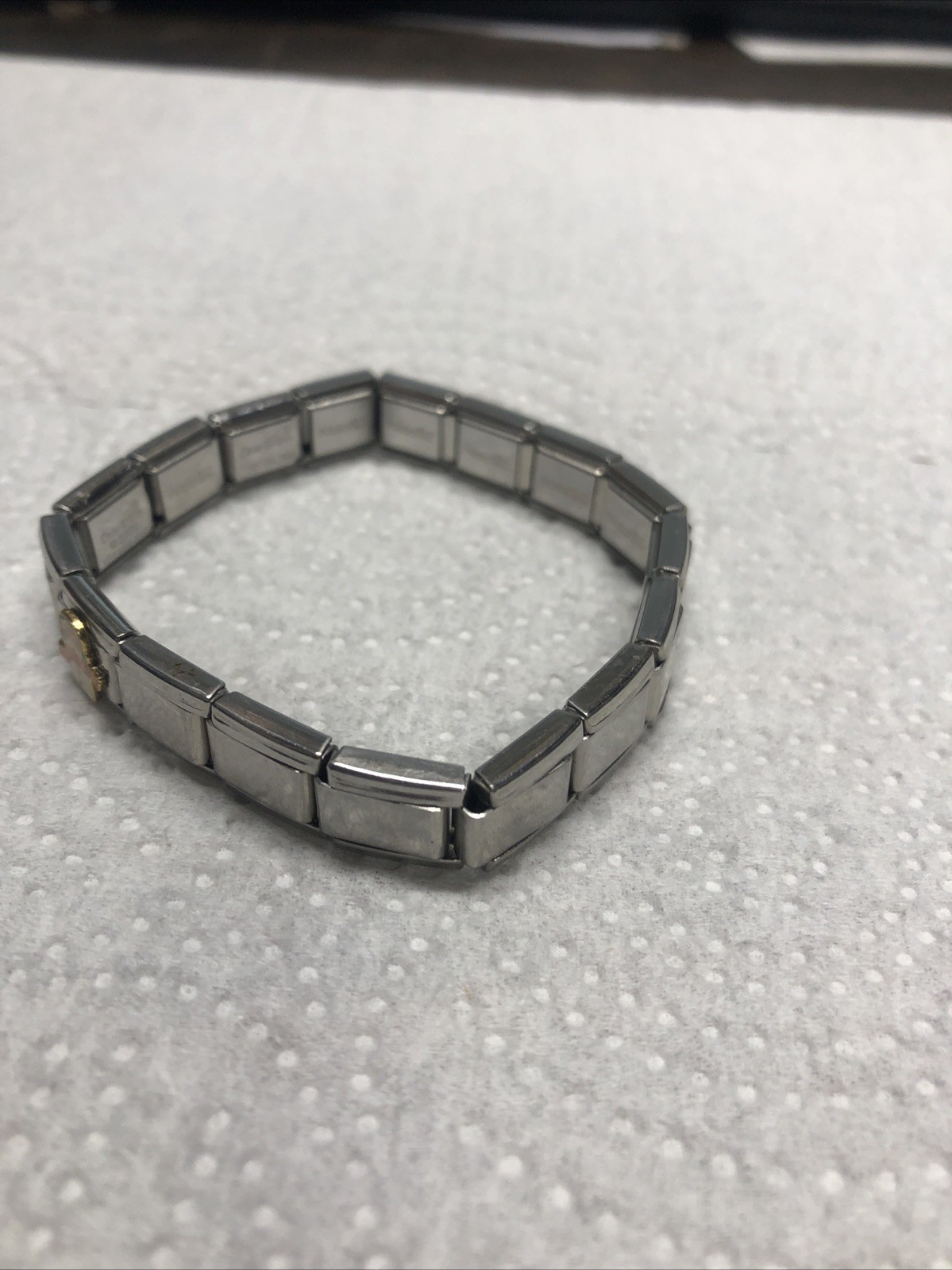 2003- CASA D’ORO ITALIAN STAINLESS STEEL 17 CHARM LINKS STRETCH BRACELET
